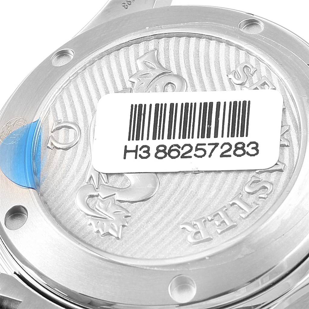 This image shows the engraved case back of an Omega Seamaster 212.30.36.20.01.002 Men
s Stainless Steel Black Dial 212.30.36.20.01.002 Men
s Stainless Steel Black Dial watch viewed from the back, with a barcode label attached.