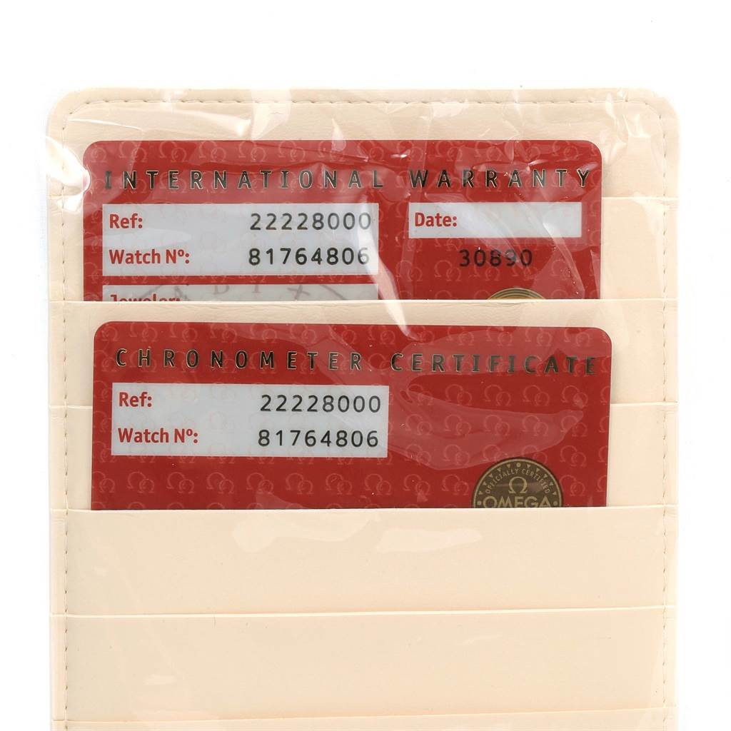 The image shows the international warranty and chronometer certificate cards for an Omega Seamaster 2222.80.00 Men
s Stainless Steel Blue Dial 2222.80.00 Men
s Stainless Steel Blue Dial watch.