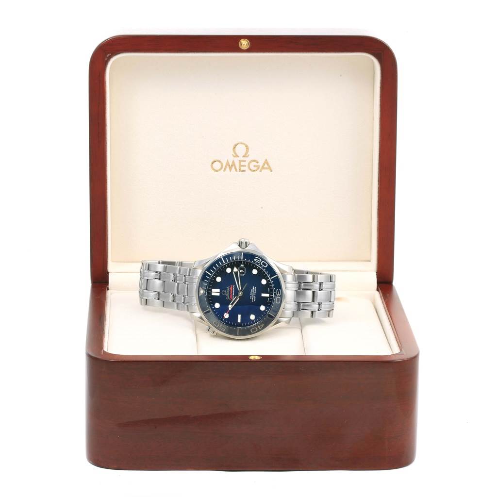 The Omega Seamaster 212.30.41.20.03.001 Men
s Stainless Steel Blue Dial 212.30.41.20.03.001 Men
s Stainless Steel Blue Dial watch is displayed front-on with its stainless steel band inside an open Omega branded box.