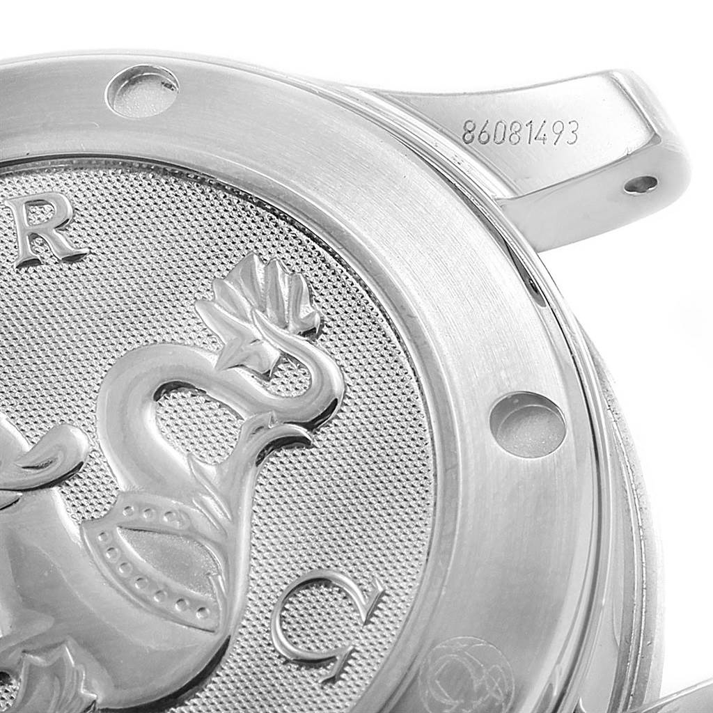 This image shows a close-up view of the case back of an Omega Seamaster 212.30.36.20.01.001 Men
s Stainless Steel Black Dial 212.30.36.20.01.001 Men
s Stainless Steel Black Dial watch, featuring the model
s engraved emblem and serial number.