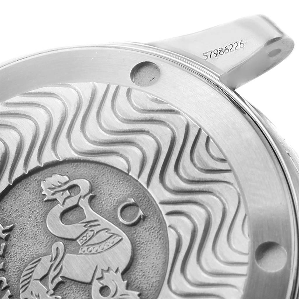 The image shows a close-up of the case back of an Omega Seamaster 2263.80.00 Men
s Stainless Steel Blue Dial 2263.80.00 Men
s Stainless Steel Blue Dial watch, highlighting the engraved design and serial number.