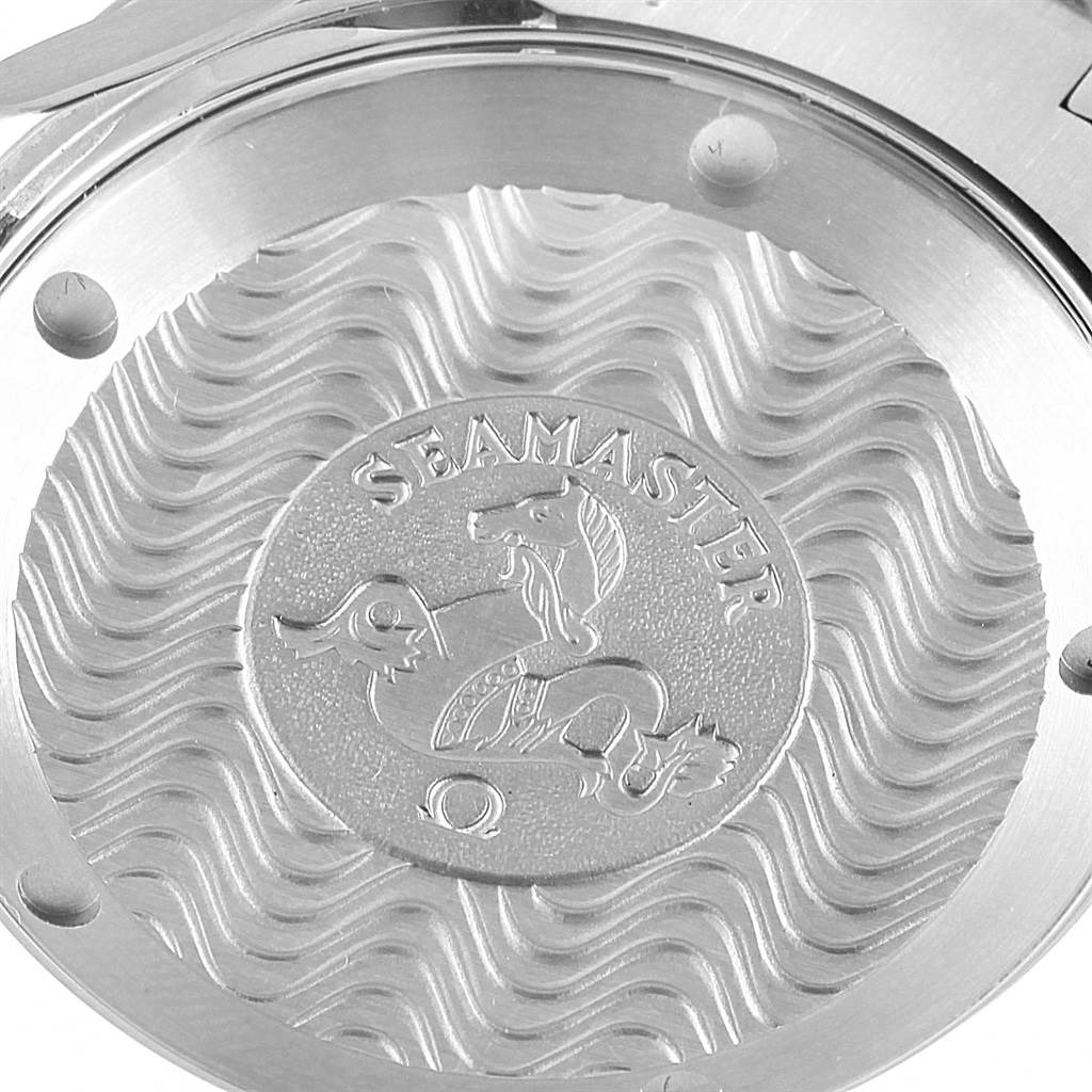 The image shows the engraved case back of an Omega Seamaster 2263.80.00 Men
s Stainless Steel Blue Dial 2263.80.00 Men
s Stainless Steel Blue Dial watch from an angled, close-up perspective.