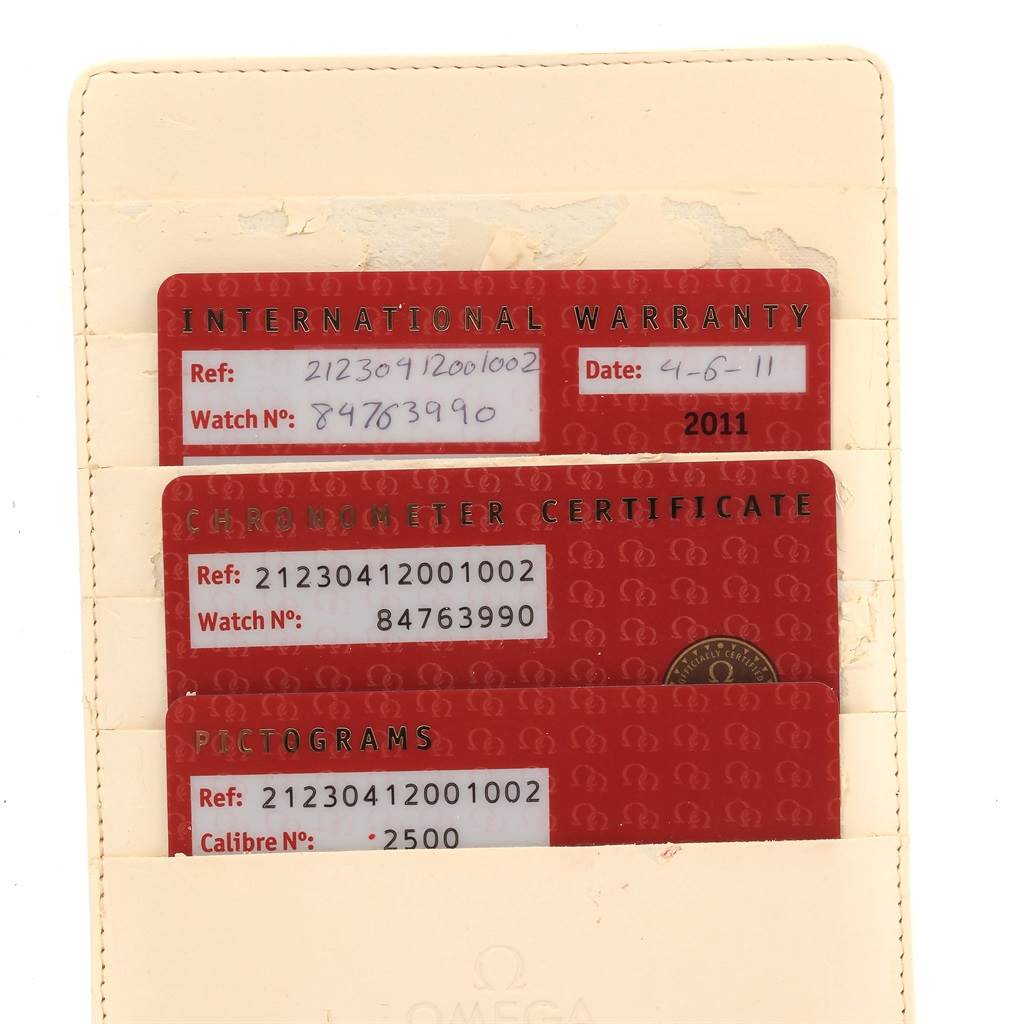 The image shows warranty, chronometer certificate, and pictogram cards for an Omega Seamaster 212.30.41.20.01.002 Men
s Stainless Steel Black Dial 212.30.41.20.01.002 Men
s Stainless Steel Black Dial watch.