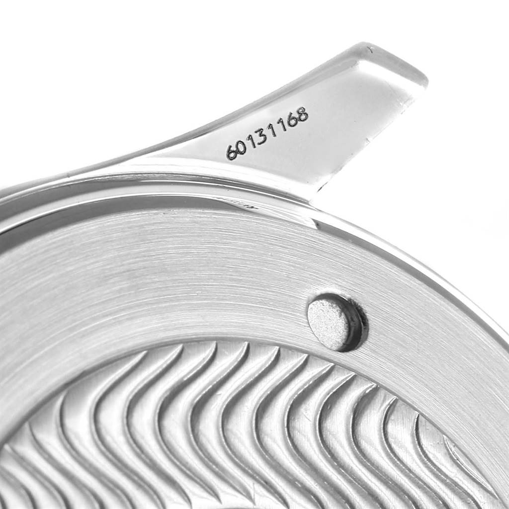 The image shows a close-up of the case back and part of the bracelet of an Omega Seamaster 2531.80.00 Men
s Stainless Steel Blue Dial 2531.80.00 Men
s Stainless Steel Blue Dial watch with visible serial number 60131168.