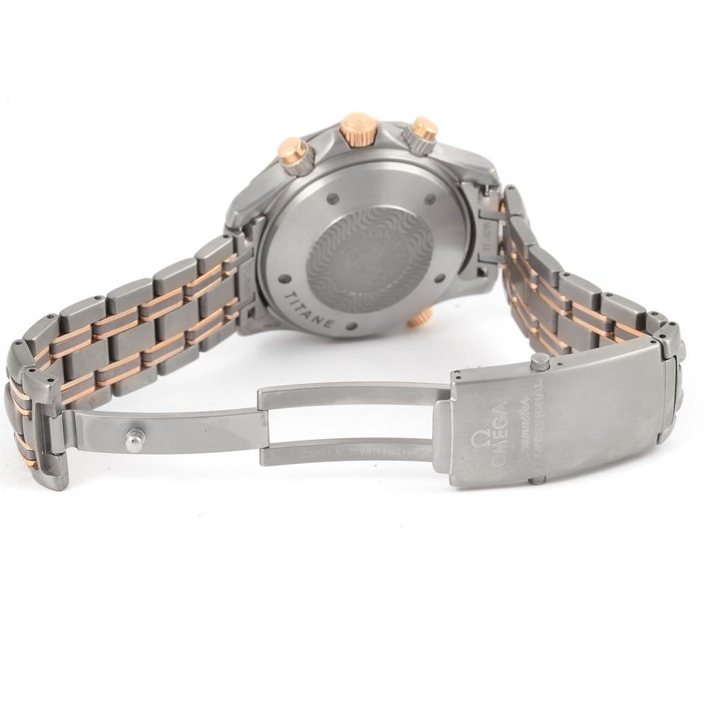 The image shows the back case and clasp of the Omega Seamaster 2296.80.00 Titanium Blue Dial 2296.80.00 Titanium Blue Dial watch, with the bracelet partially unfastened.