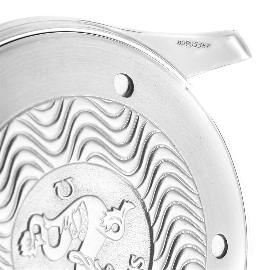 This image shows a close-up of the case back of an Omega Seamaster 2254.50.00 Men
s Stainless Steel Black Dial 2254.50.00 Men
s Stainless Steel Black Dial watch, featuring engravings and a serial number.