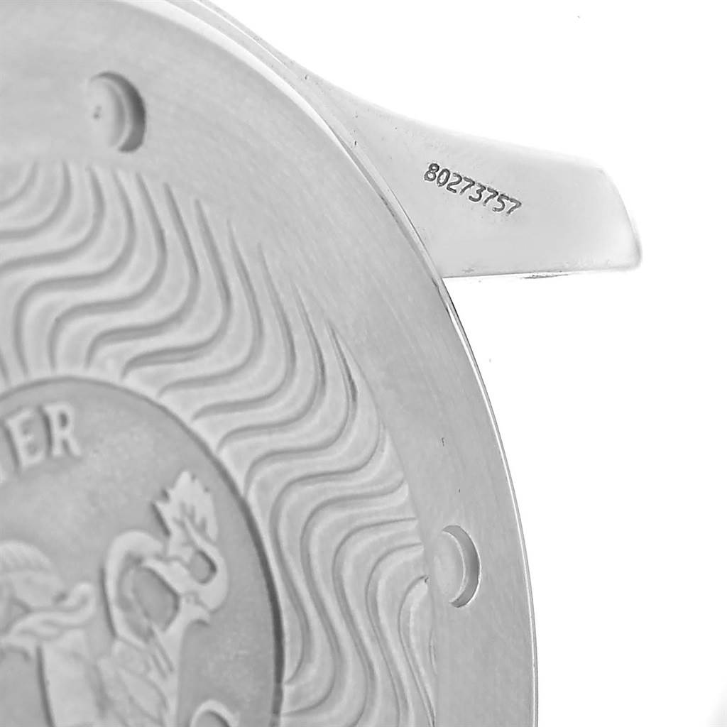 The image shows a close-up of the case back and part of the lug of an Omega Seamaster 2531.80.00 Men
s Stainless Steel Blue Dial 2531.80.00 Men
s Stainless Steel Blue Dial watch, featuring wavy engravings and the serial number.