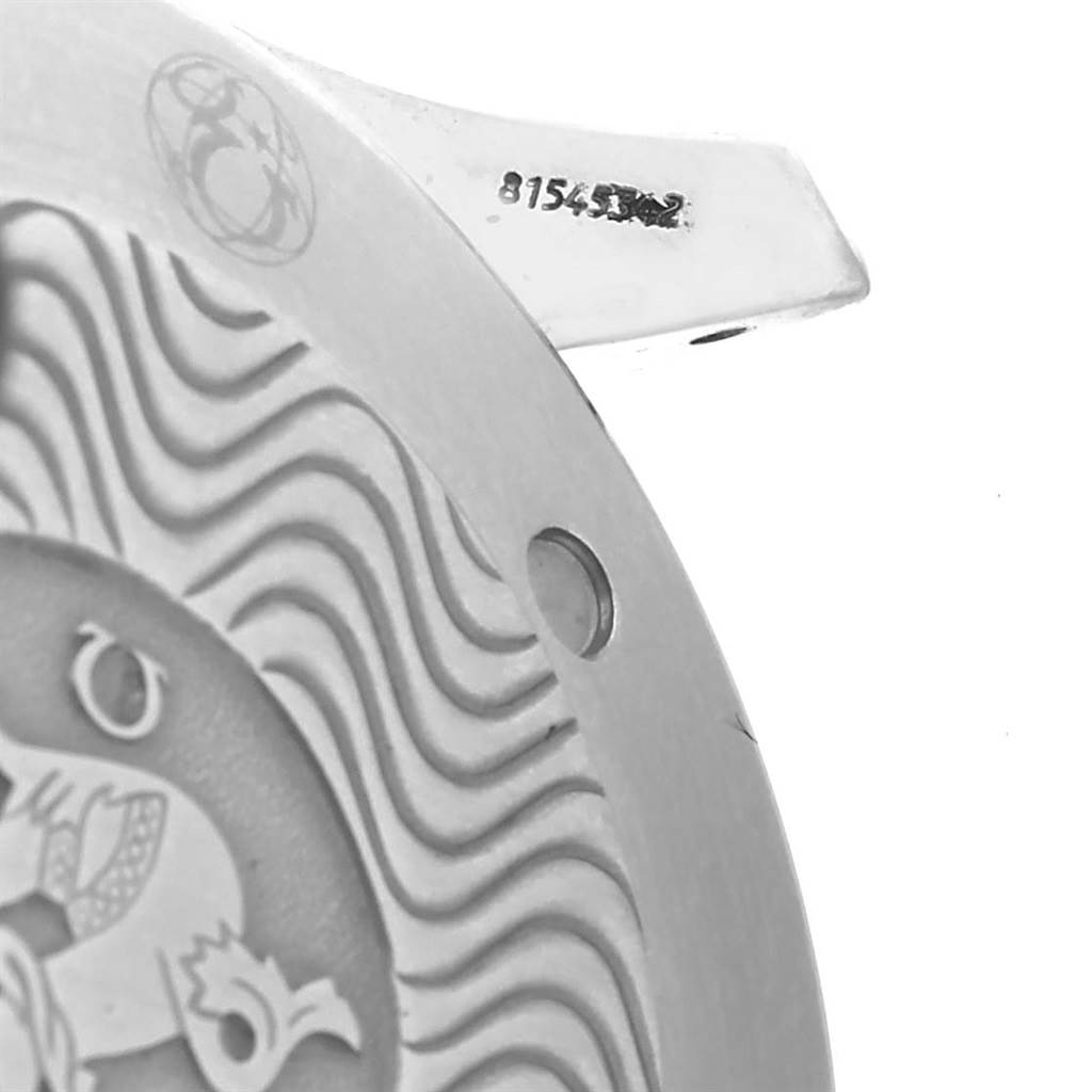 This is a close-up of the Omega Seamaster 2254.50.00 Men
s Stainless Steel Black Dial 2254.50.00 Men
s Stainless Steel Black Dial
s case back, displaying its engravings and part of the serial number.