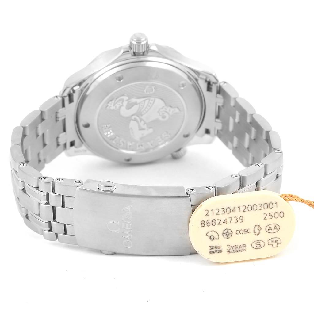 The image shows the back and clasp of an Omega Seamaster 212.30.41.20.03.001 Men
s Stainless Steel Blue Dial 212.30.41.20.03.001 Men
s Stainless Steel Blue Dial watch, along with its linked bracelet and a tag.