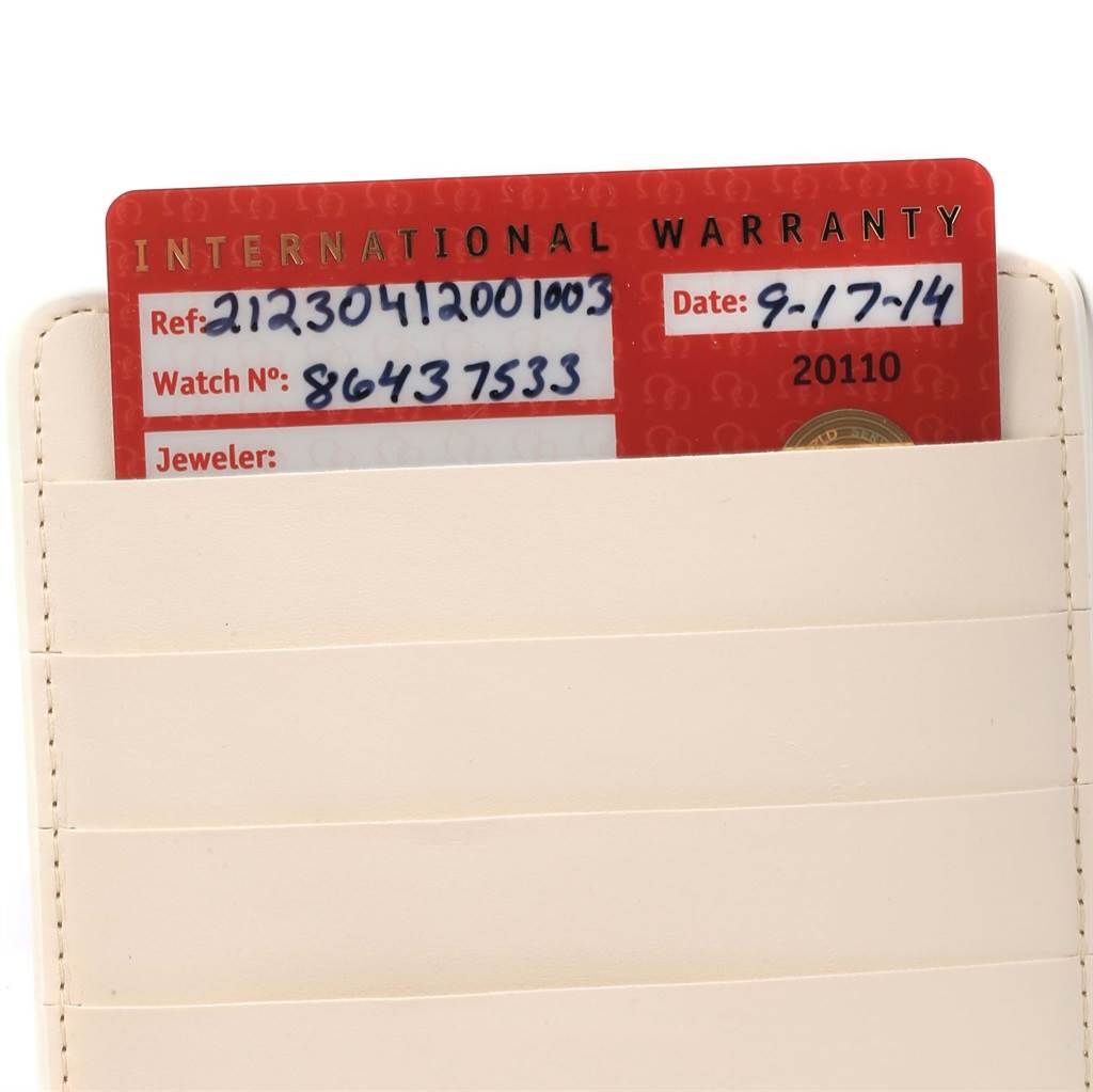 This image shows the international warranty card for an Omega Seamaster 212.30.41.20.01.003 Men
s Stainless Steel Black Dial 212.30.41.20.01.003 Men
s Stainless Steel Black Dial watch, partially inserted in a cream-colored cardholder.