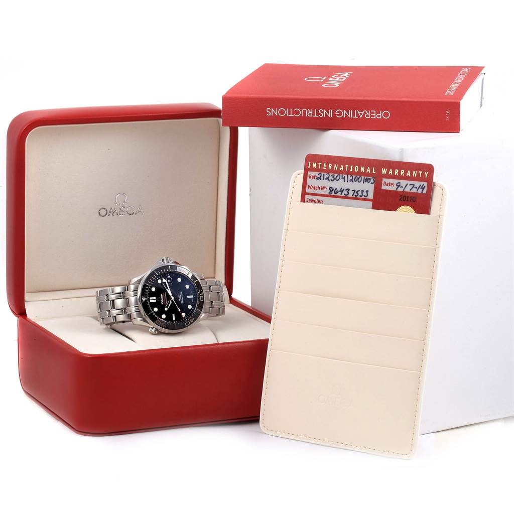 The image shows an Omega Seamaster 212.30.41.20.01.003 Men
s Stainless Steel Black Dial 212.30.41.20.01.003 Men
s Stainless Steel Black Dial watch at a front angle, alongside its box, international warranty card, and operating instructions.