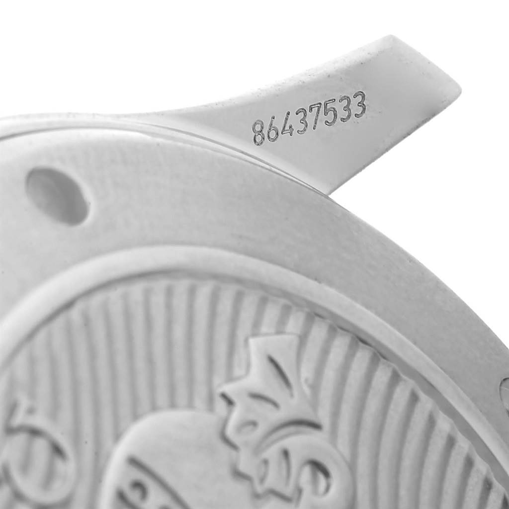 This image shows a close-up of the case back and part of the strap attachment of an Omega Seamaster 212.30.41.20.01.003 Men
s Stainless Steel Black Dial 212.30.41.20.01.003 Men
s Stainless Steel Black Dial watch, including the serial number.