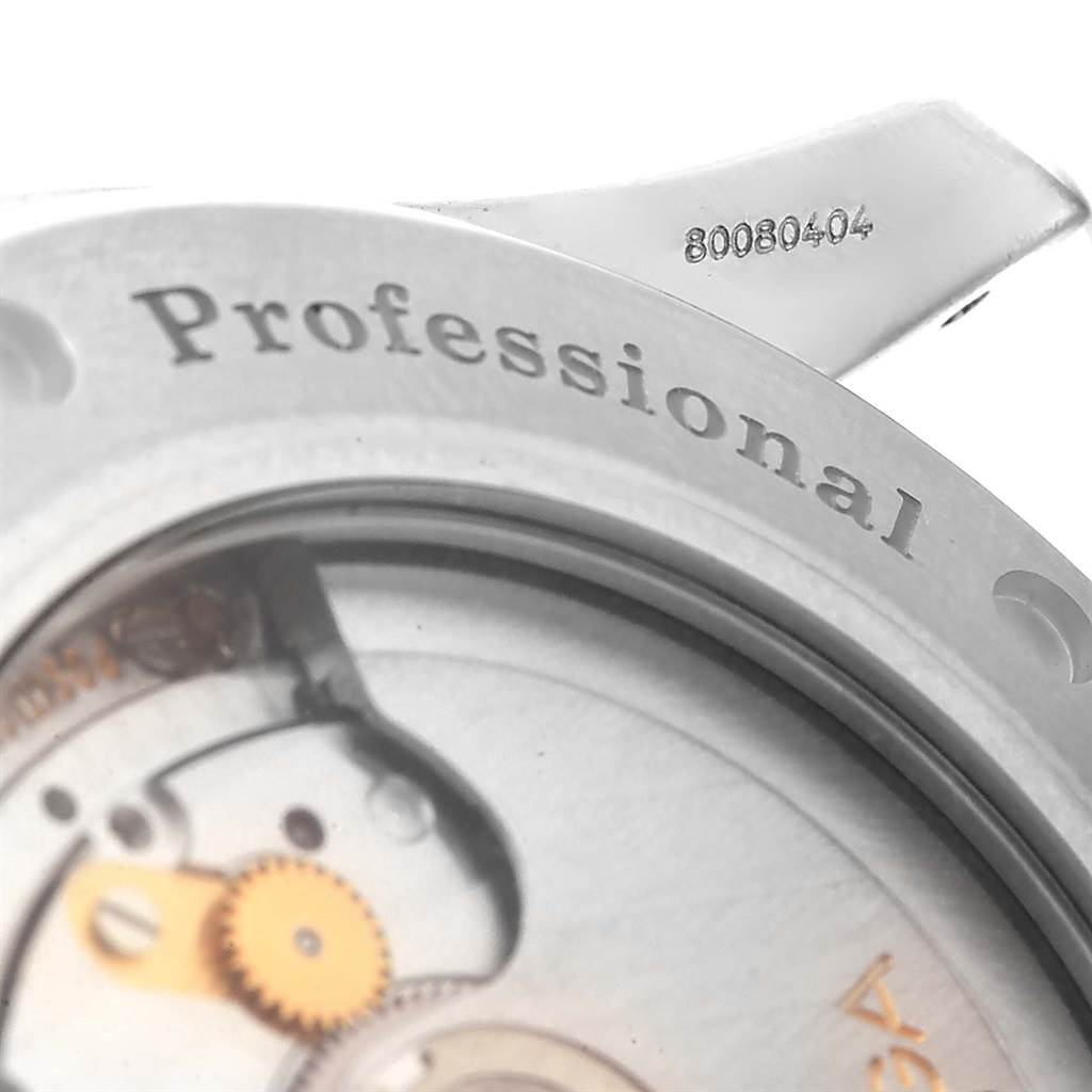 This close-up image of the Omega Seamaster 2535.80.00 Men
s Stainless Steel Blue Dial 2535.80.00 Men
s Stainless Steel Blue Dial watch showcases the inner mechanism and "Professional" engraving on the back case.