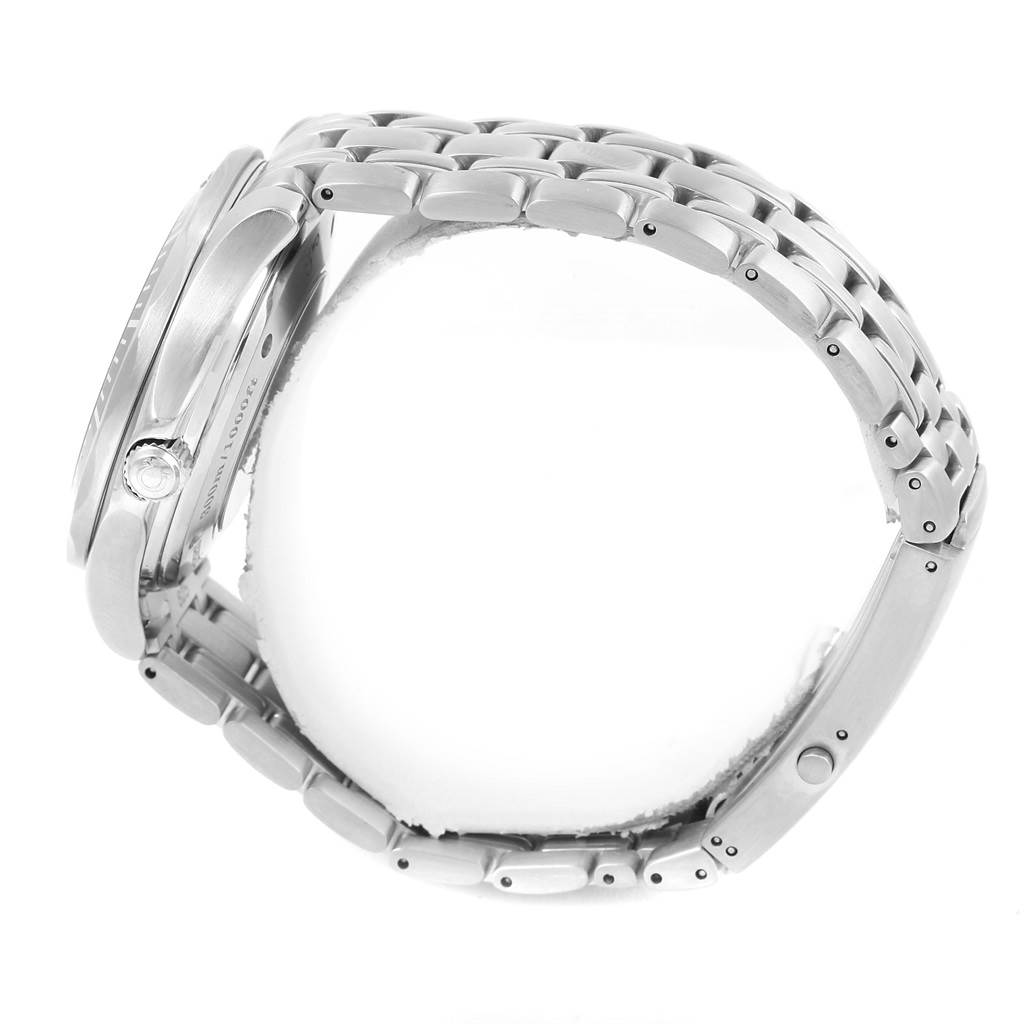 The image shows a side view of an Omega Seamaster 2535.80.00 Men
s Stainless Steel Blue Dial 2535.80.00 Men
s Stainless Steel Blue Dial watch, focusing on the case, crown, and metal bracelet.