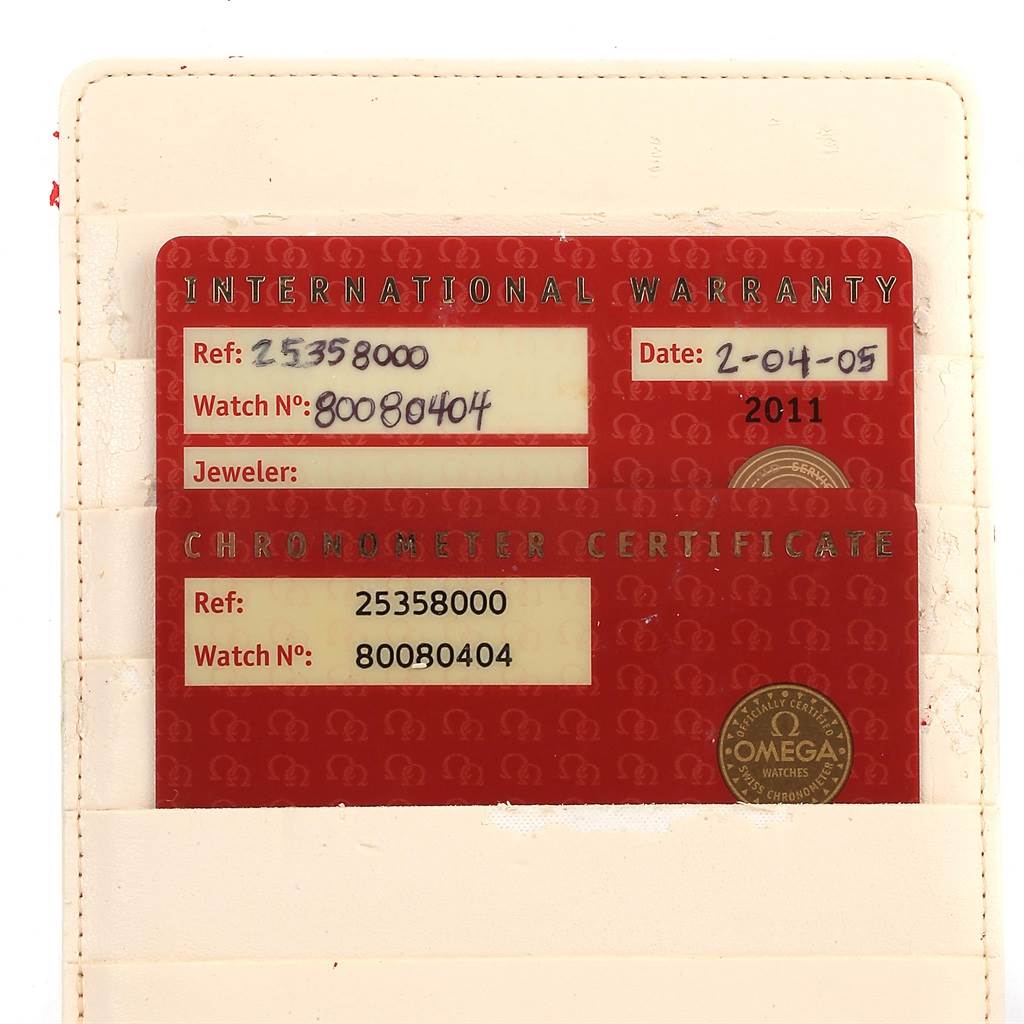 The image shows an Omega Seamaster 2535.80.00 Men
s Stainless Steel Blue Dial 2535.80.00 Men
s Stainless Steel Blue Dial watch
s International Warranty card in a carrying case.