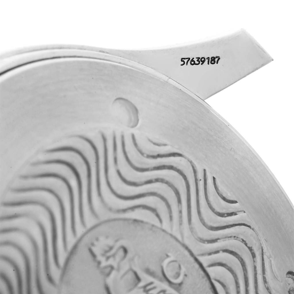 The image shows a close-up of the Omega Seamaster 2541.80.00 Men
s Stainless Steel Blue Dial 2541.80.00 Men
s Stainless Steel Blue Dial watch
s back with engraved patterns and serial number.