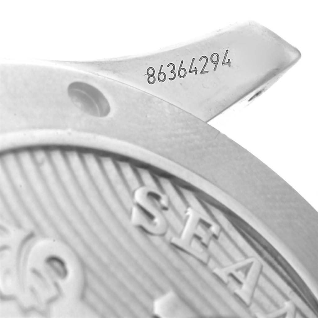 The image shows a close-up of the case back and serial number of an Omega Seamaster 212.30.41.20.01.003 Men
s Stainless Steel Black Dial 212.30.41.20.01.003 Men
s Stainless Steel Black Dial watch.