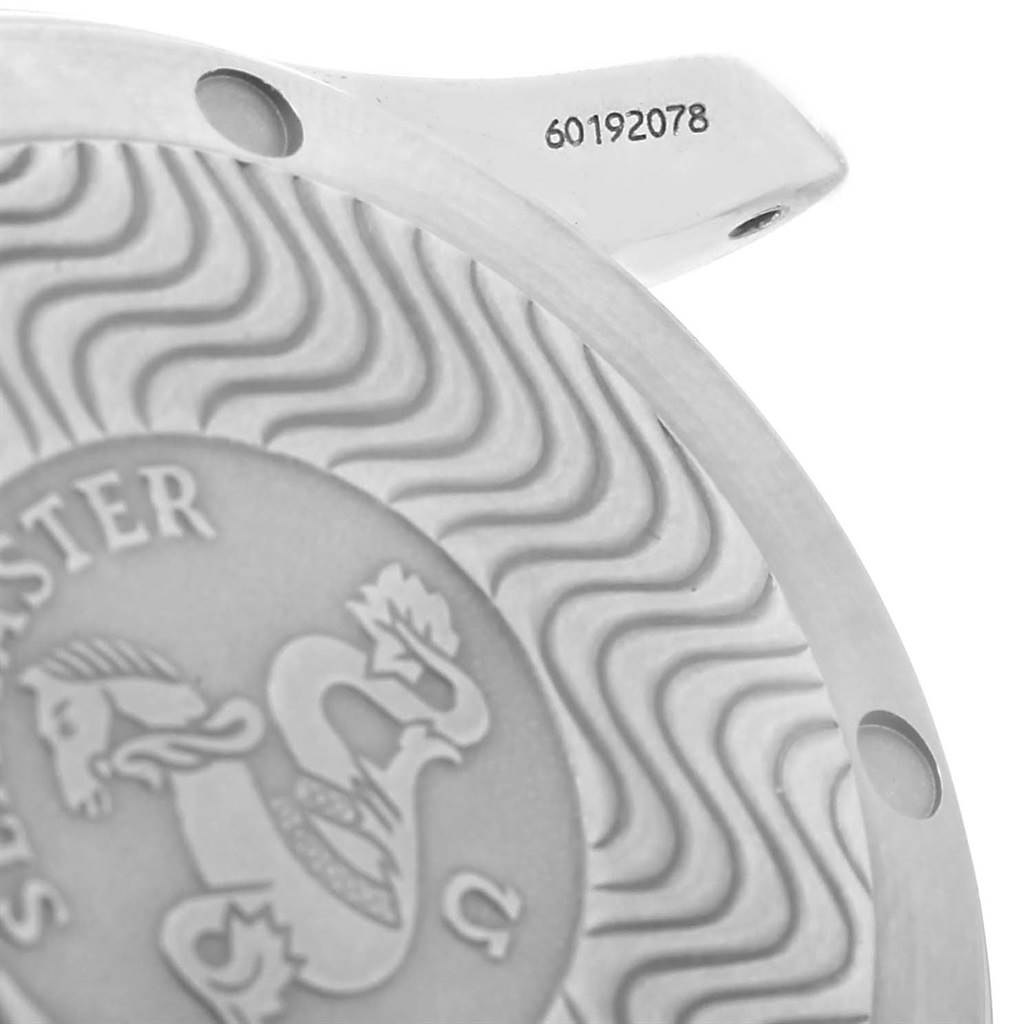 The image shows a close-up of the back case of an Omega Seamaster 2551.80.00 Men
s Stainless Steel Blue Dial 2551.80.00 Men
s Stainless Steel Blue Dial watch, featuring the wave pattern and part of the serial number.