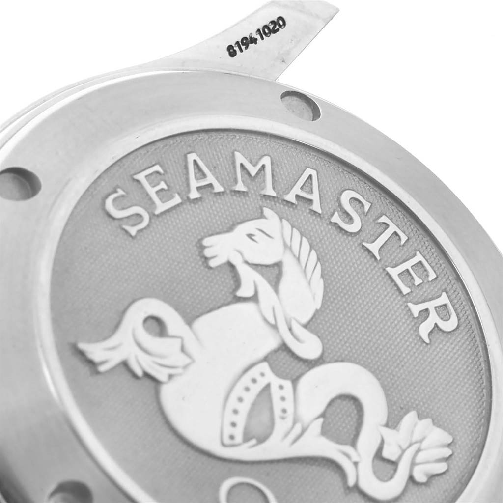 The image shows a close-up angle of the case back from an Omega Seamaster 212.30.36.20.01.001 Men
s Stainless Steel Black Dial 212.30.36.20.01.001 Men
s Stainless Steel Black Dial watch, highlighting the embossed logo and text.