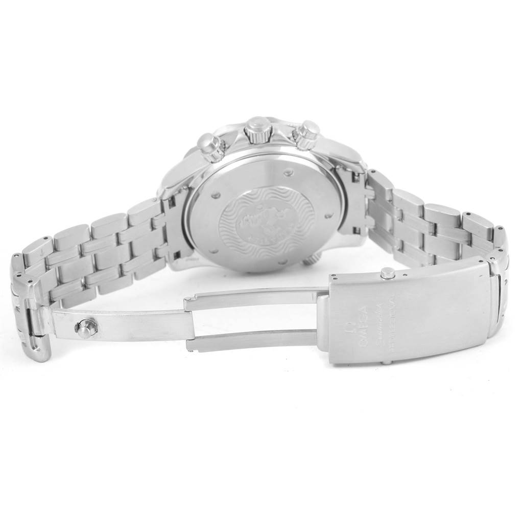 The image shows the back of the Omega Seamaster 2599.80.00 Men
s Stainless Steel Blue Dial 2599.80.00 Men
s Stainless Steel Blue Dial watch, showcasing its closed caseback and partially opened stainless steel bracelet with clasp.