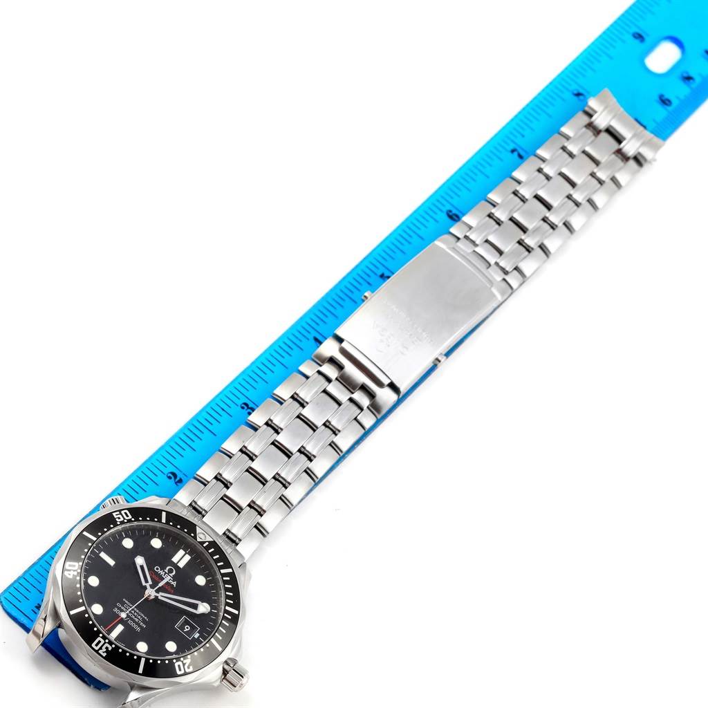 The image shows an Omega Seamaster 212.30.41.20.01.002 Men
s Stainless Steel Black Dial 212.30.41.20.01.002 Men
s Stainless Steel Black Dial watch placed flat, fully extended with its face and stainless steel bracelet displayed beside a ruler.