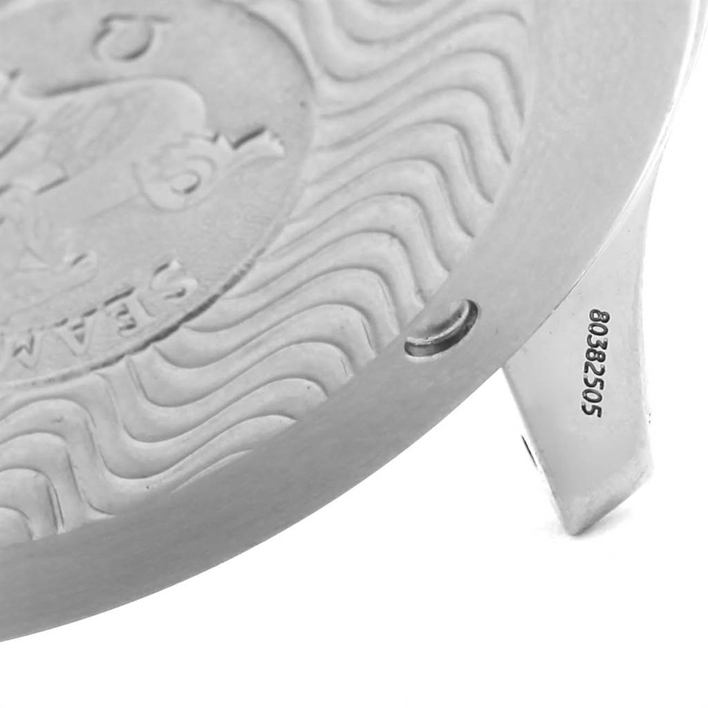 The image shows a close-up of the back casing of an Omega Seamaster 2254.50.00 Men
s Stainless Steel Black Dial 2254.50.00 Men
s Stainless Steel Black Dial watch, including part of the engraving and the serial number.