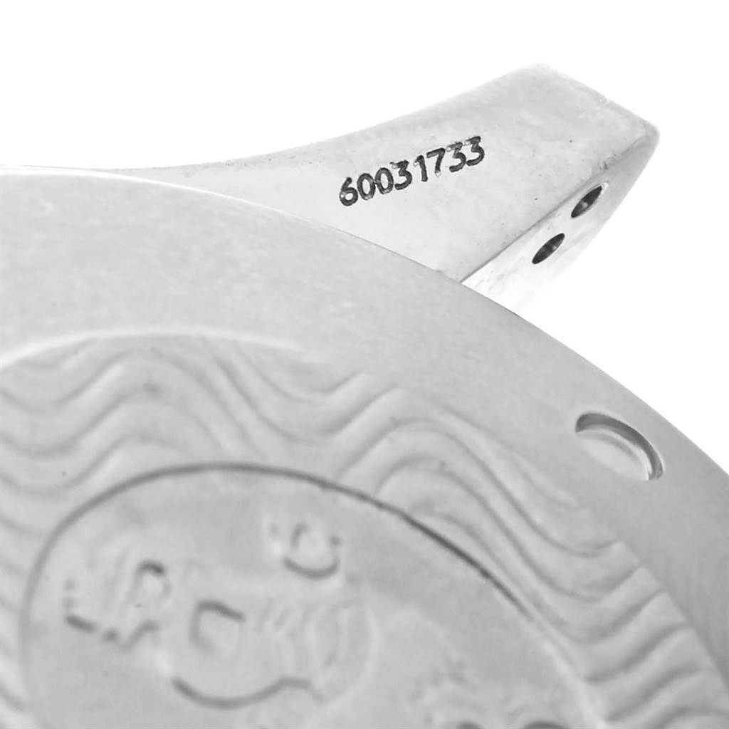 The image shows a close-up of the back case and lug of an Omega Seamaster 2398.80.00 Men's Steel and Gold (two tone) Blue Dial 2398.80.00 Men's Steel and Gold (two tone) Blue Dial watch, highlighting its serial number.