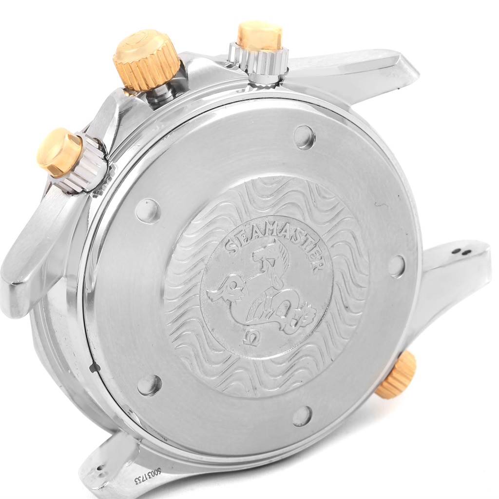 The image shows the back case and crown of the Omega Seamaster 2398.80.00 Men's Steel and Gold (two tone) Blue Dial 2398.80.00 Men's Steel and Gold (two tone) Blue Dial watch, focusing on the engraved case back.