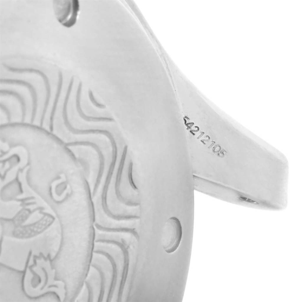 The image shows the back case and partial lugs of the Omega Seamaster 2598.80.00 Men
s Stainless Steel Blue Dial 2598.80.00 Men
s Stainless Steel Blue Dial watch, highlighting its engraved design and serial number.