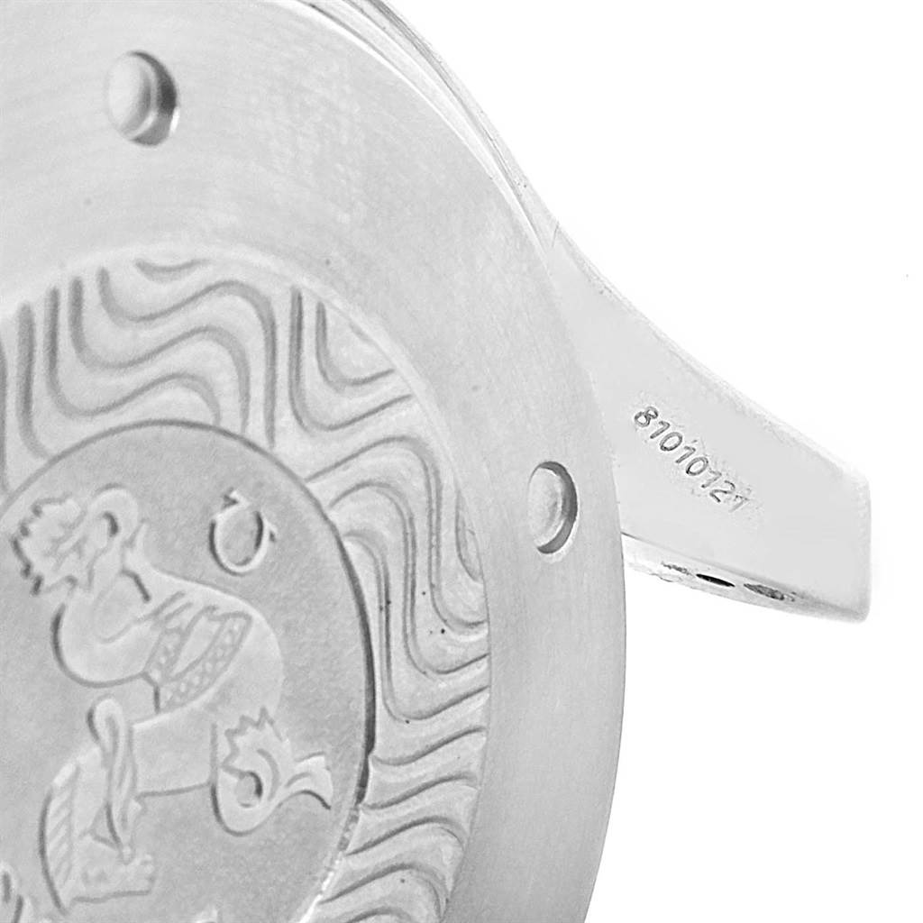 This image shows a close-up of the case back and part of the lug of an Omega Seamaster 2599.80.00 Men's Stainless Steel Blue Dial 2599.80.00 Men's Stainless Steel Blue Dial watch, highlighting its engraved design and serial number.