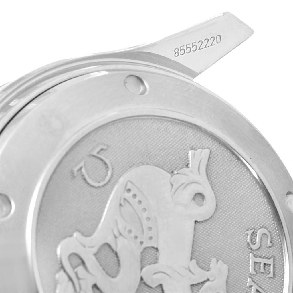 This image shows the back case and lug of the Omega Seamaster 213.30.42.40.01.001 Men
s Stainless Steel Black Dial 213.30.42.40.01.001 Men
s Stainless Steel Black Dial watch, including part of the engraved serial number.