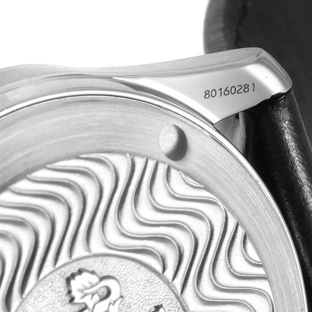 This close-up of the Omega Seamaster 2252.50.00 Men
s Stainless Steel Black Dial 2252.50.00 Men
s Stainless Steel Black Dial shows the case back with the serial number and decorative engravings.