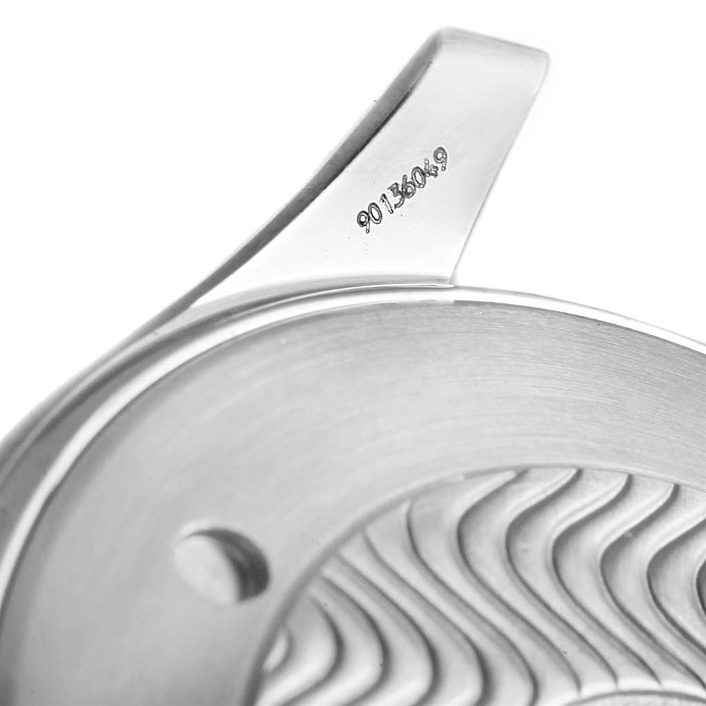 The image shows a close-up of the Omega Seamaster 2264.50.00 Men
s Stainless Steel Black Dial 2264.50.00 Men
s Stainless Steel Black Dial watch bezel and lugs, highlighting a serial number engraving.