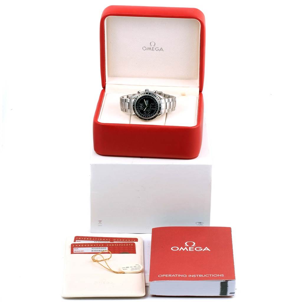 The Omega Seamaster 3220.50.00 Men's Stainless Steel Black Dial 3220.50.00 Men's Stainless Steel Black Dial watch is displayed front-facing in its open box with accessories including operating instructions and warranty papers.