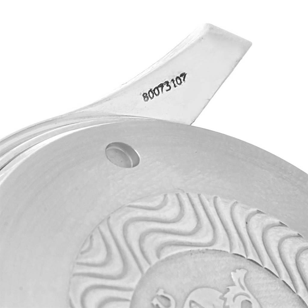 The image shows a close-up view of the case back of an Omega Seamaster 2599.80.00 Men
s Stainless Steel Blue Dial 2599.80.00 Men
s Stainless Steel Blue Dial watch with engravings.