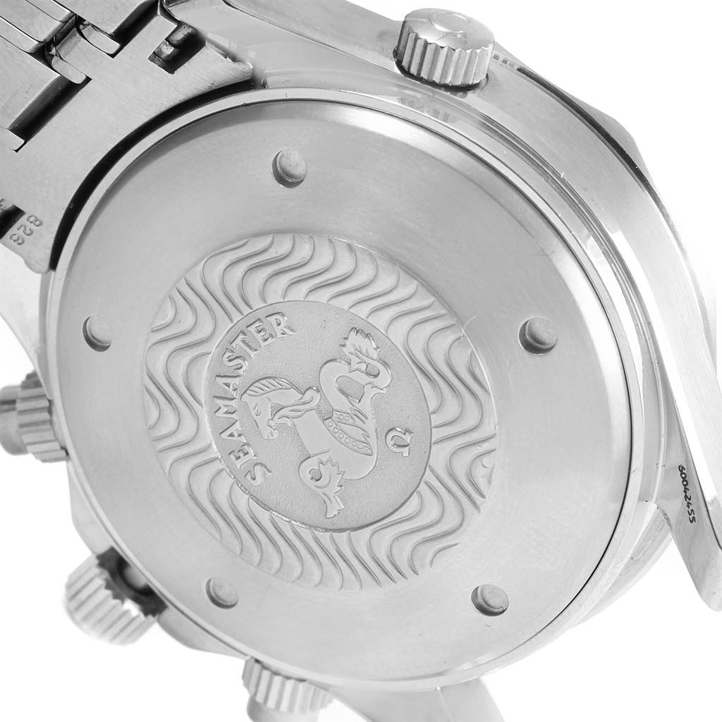 The image shows the back case of an Omega Seamaster 2599.80.00 Men
s Stainless Steel Blue Dial 2599.80.00 Men
s Stainless Steel Blue Dial watch, highlighting its engraved logo and the stainless steel bracelet attachment.