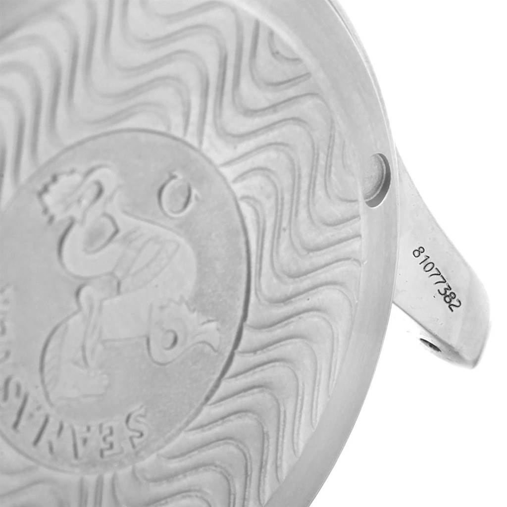 The image shows the engraved case back and serial number of an Omega Seamaster 2252.50.00 Men's Stainless Steel Black Dial 2252.50.00 Men's Stainless Steel Black Dial watch from a close-up angle.