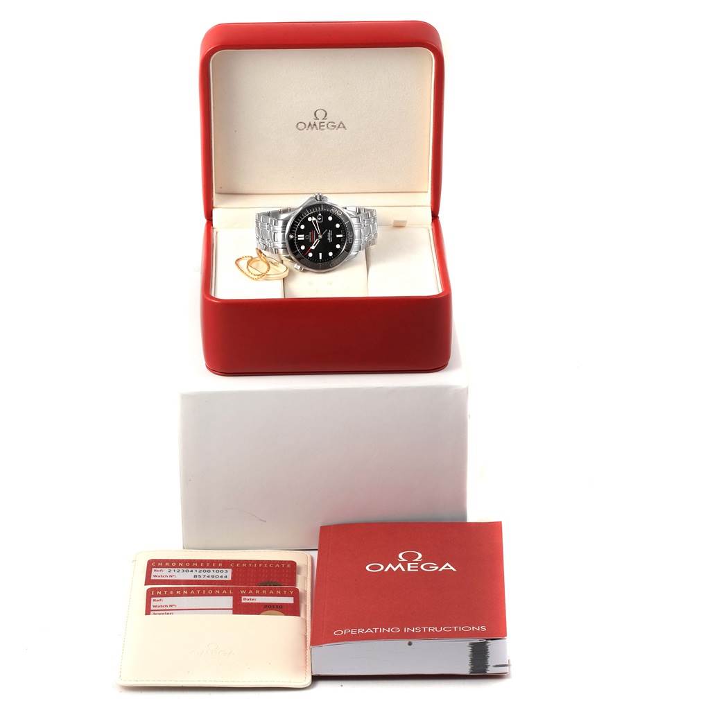 The Omega Seamaster 212.30.41.20.01.003 Men
s Stainless Steel Black Dial 212.30.41.20.01.003 Men
s Stainless Steel Black Dial watch is pictured from the front in an open case, alongside a warranty card and an instruction manual.