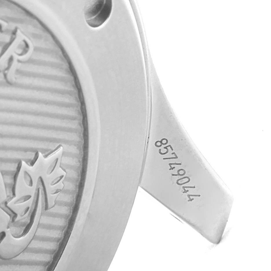 The image shows a close-up of the side case and lug of an Omega Seamaster 212.30.41.20.01.003 Men
s Stainless Steel Black Dial 212.30.41.20.01.003 Men
s Stainless Steel Black Dial watch, highlighting part of the serial number.