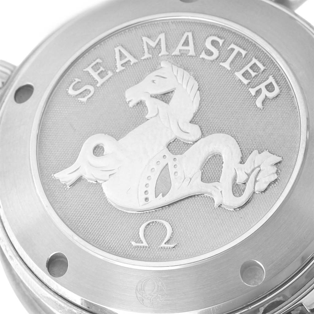 The image shows the case back of an Omega Seamaster 2599.80.00 Men
s Stainless Steel Blue Dial 2599.80.00 Men
s Stainless Steel Blue Dial watch, featuring the brand’s logo and seahorse emblem.