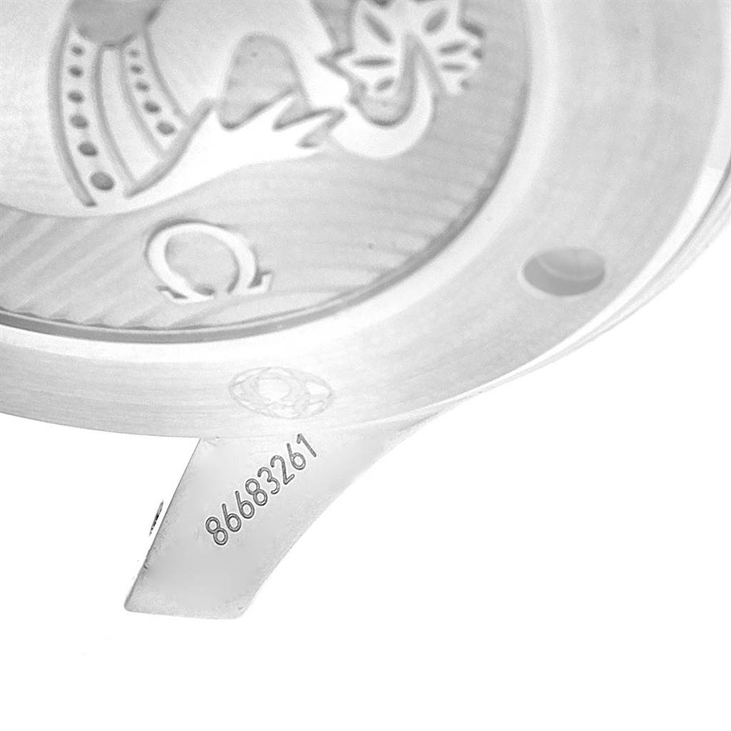 The image shows a close-up of the Omega Seamaster 212.30.41.20.01.003 Men
s Stainless Steel Black Dial 212.30.41.20.01.003 Men
s Stainless Steel Black Dial
s case back, including part of the serial number and Omega logo.