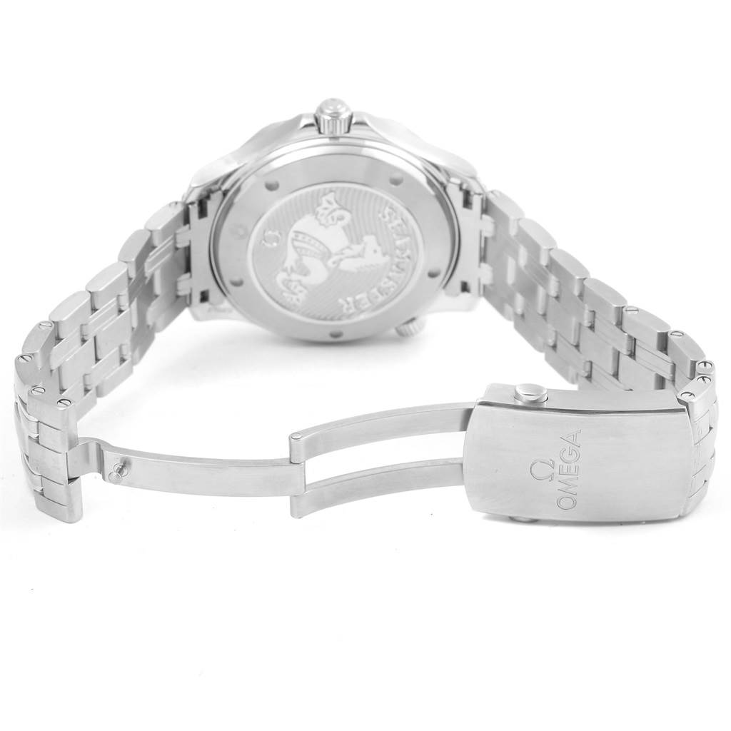 The image shows the back of an Omega Seamaster 212.30.41.20.01.003 Men
s Stainless Steel Black Dial 212.30.41.20.01.003 Men
s Stainless Steel Black Dial watch and its partially open metal clasp bracelet.