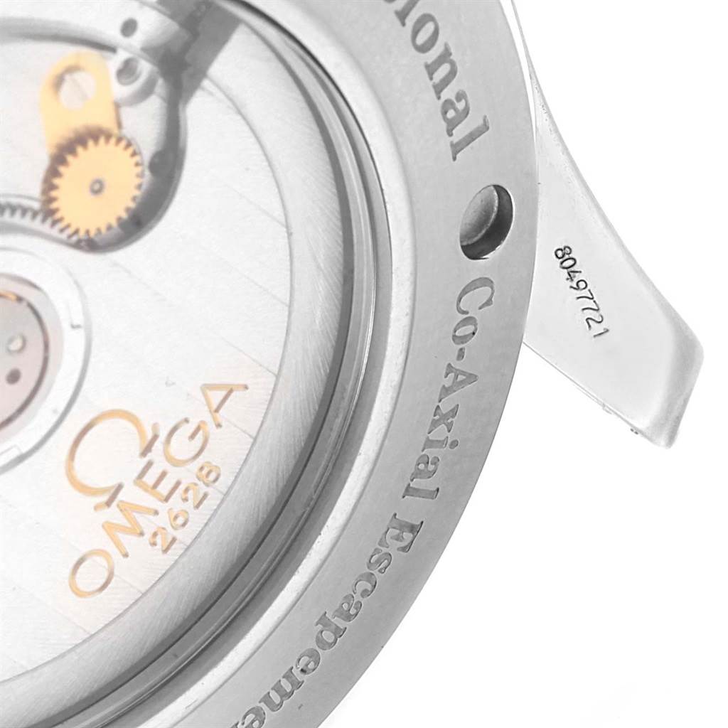 The image shows a close-up view of the back case of an Omega Seamaster 2535.80.00 Stainless Steel Blue Dial 2535.80.00 Stainless Steel Blue Dial watch, highlighting the Co-Axial Escapement.