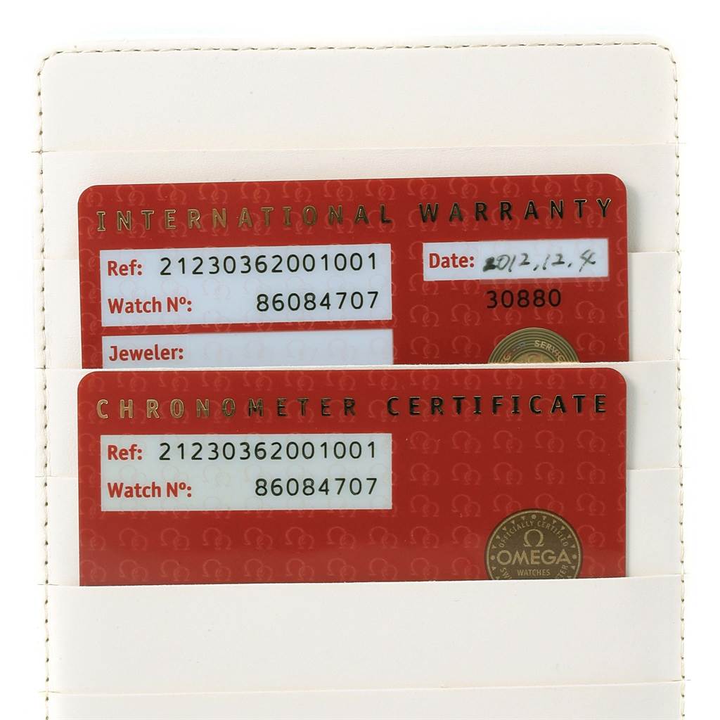 The image shows the International Warranty and Chronometer Certificate cards for an Omega Seamaster 212.30.36.20.01.001 Men's Stainless Steel Black Dial 212.30.36.20.01.001 Men's Stainless Steel Black Dial watch.