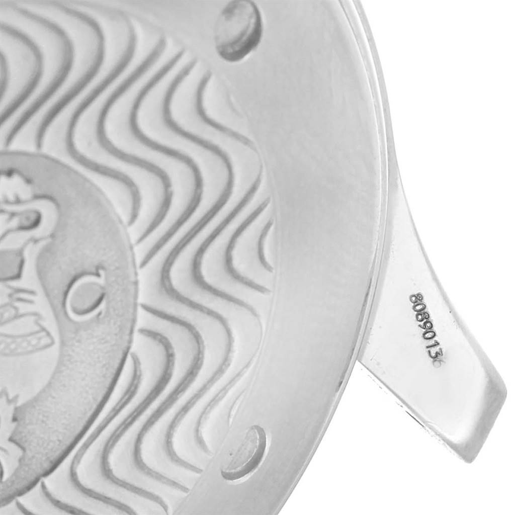 The image shows a close-up of the case back of an Omega Seamaster 2254.50.00 Men
s Stainless Steel Black Dial 2254.50.00 Men
s Stainless Steel Black Dial watch, highlighting the wave pattern and engraved details.