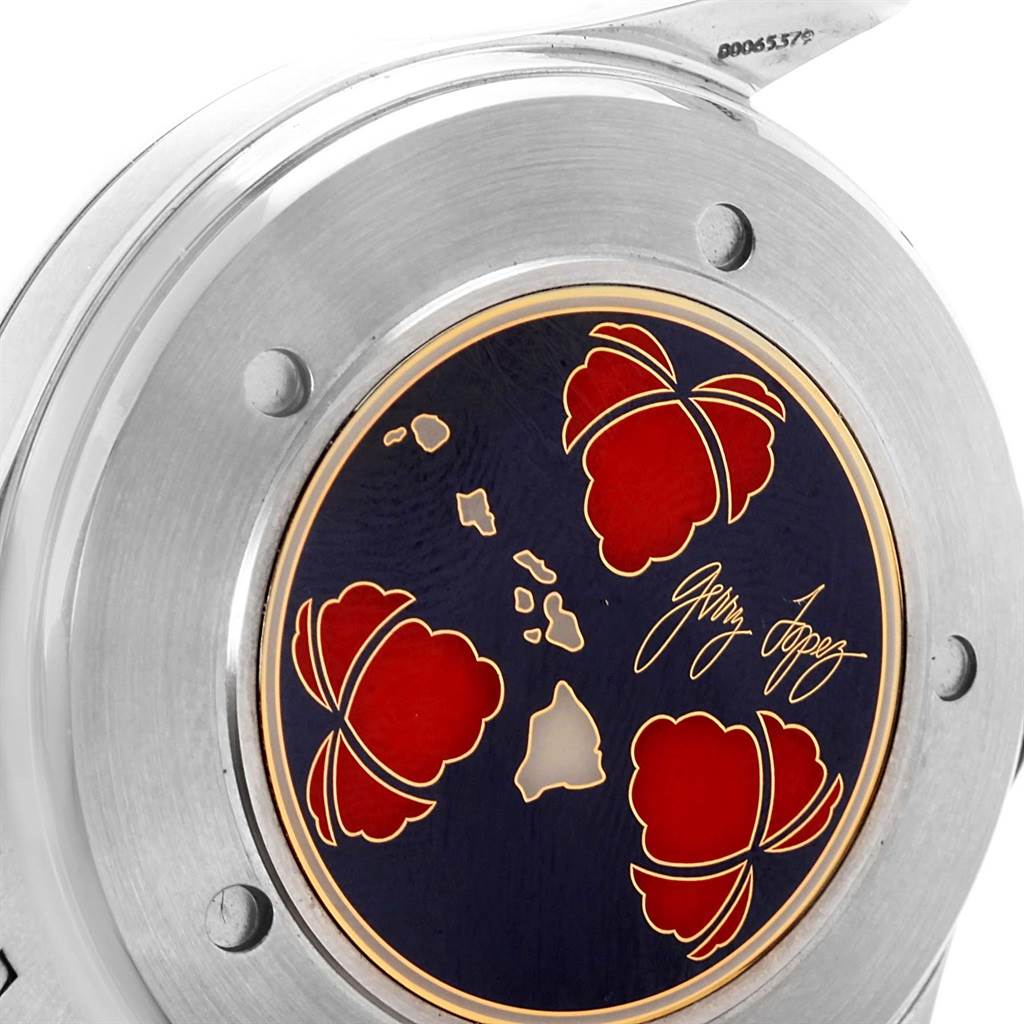 This image shows the case back of an Omega Seamaster 2536.50.00 Men's Stainless Steel Black Dial 2536.50.00 Men's Stainless Steel Black Dial watch, featuring a decorative design and signature.