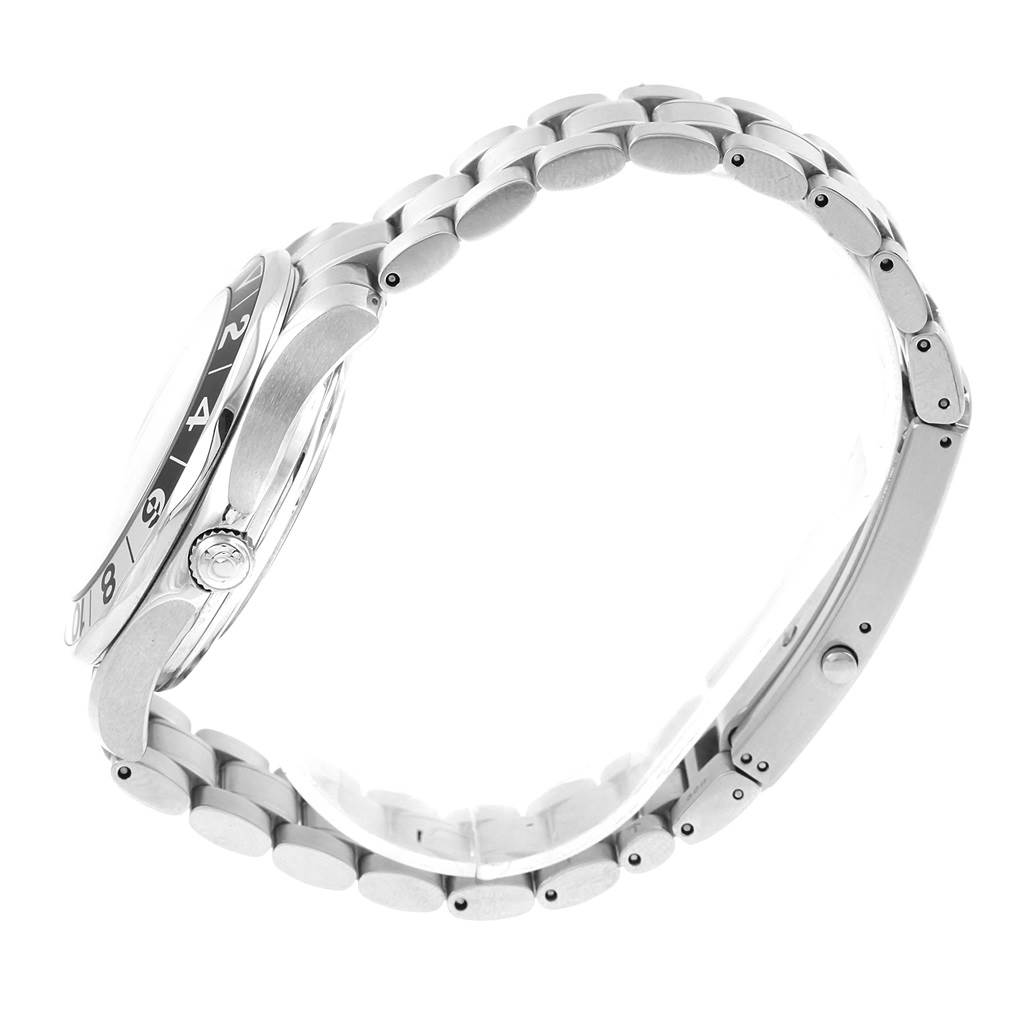 The Omega Seamaster 2536.50.00 Men's Stainless Steel Black Dial 2536.50.00 Men's Stainless Steel Black Dial watch is displayed from a side angle, showcasing its bezel, crown, and stainless steel bracelet.