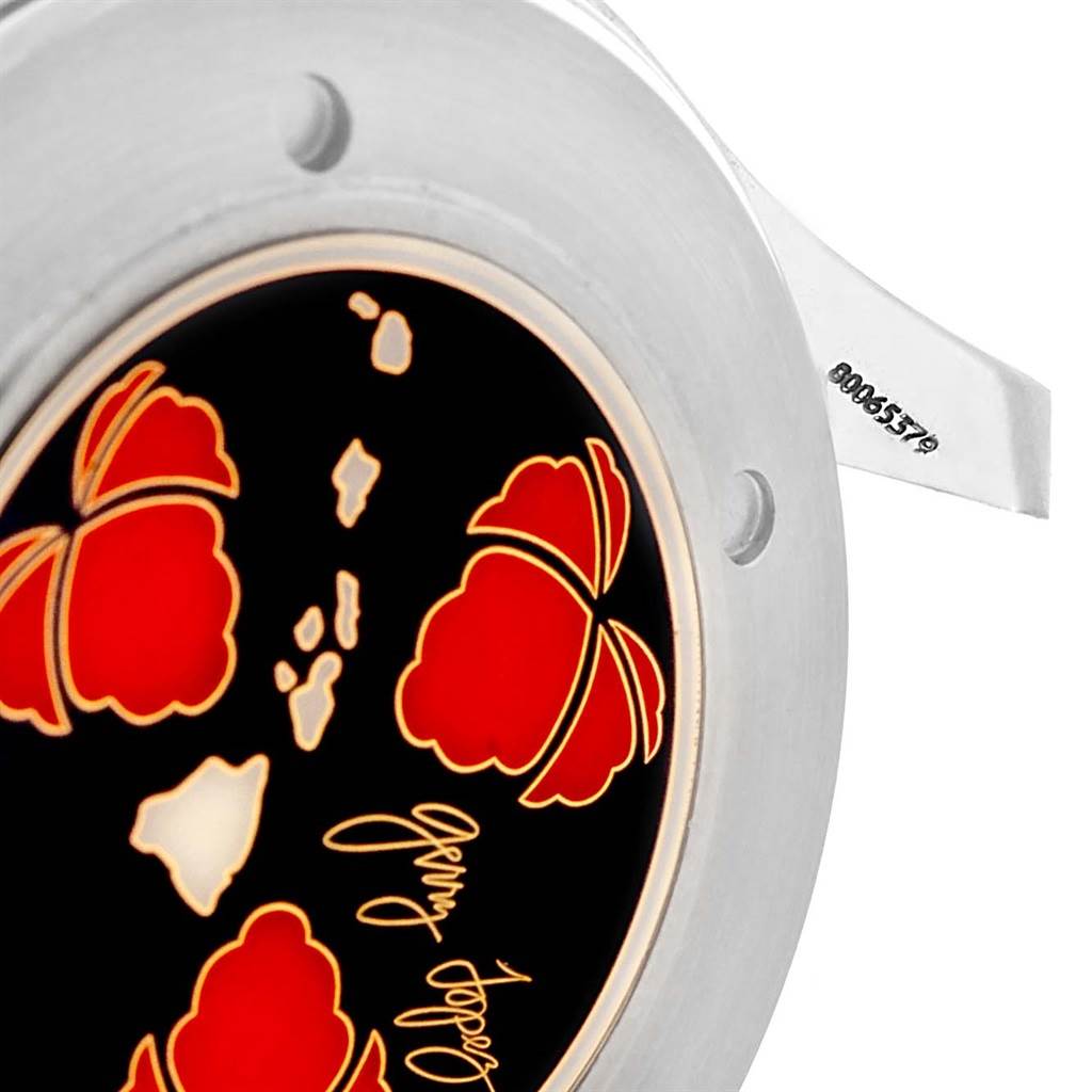 This close-up image shows the back case of an Omega Seamaster 2536.50.00 Men's Stainless Steel Black Dial 2536.50.00 Men's Stainless Steel Black Dial watch with a decorative design and a serial number engraved.