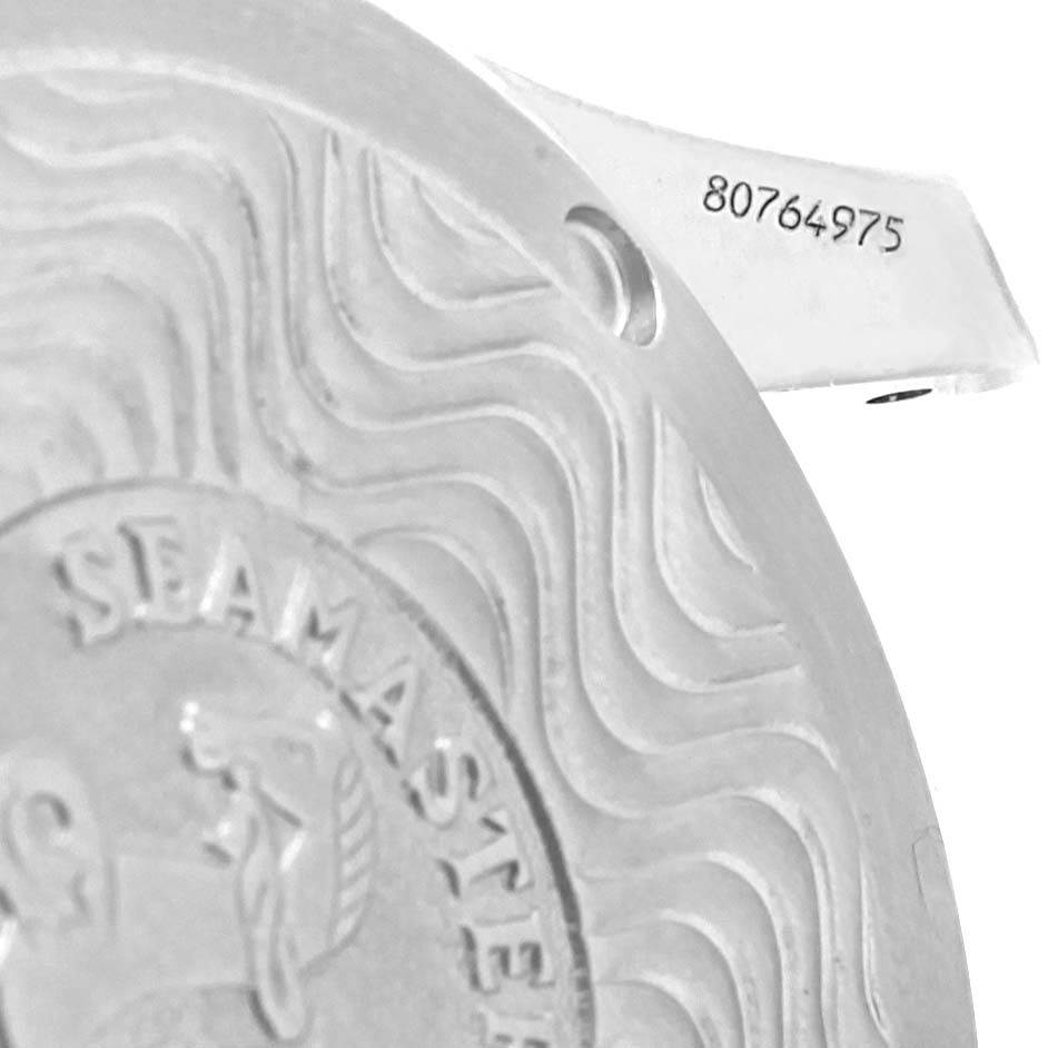 The image shows the case back and part of the serial number engraved on the Omega Seamaster Men
s Stainless Steel Black Dial Men
s Stainless Steel Black Dial watch.