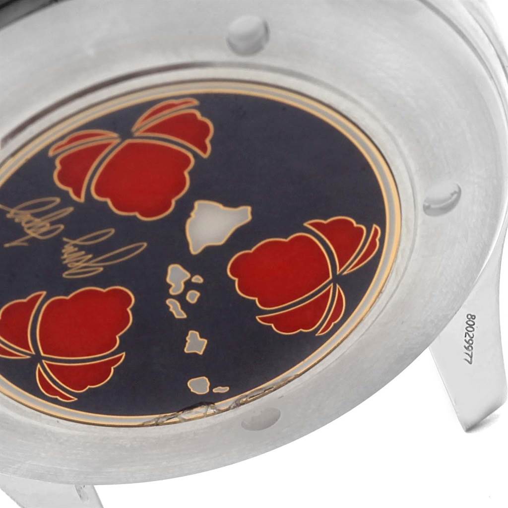 This image shows a close-up of the case back of the Omega Seamaster 2536.50.00 Men
s Stainless Steel Black Dial 2536.50.00 Men
s Stainless Steel Black Dial watch, featuring unique artwork with red and gold designs.